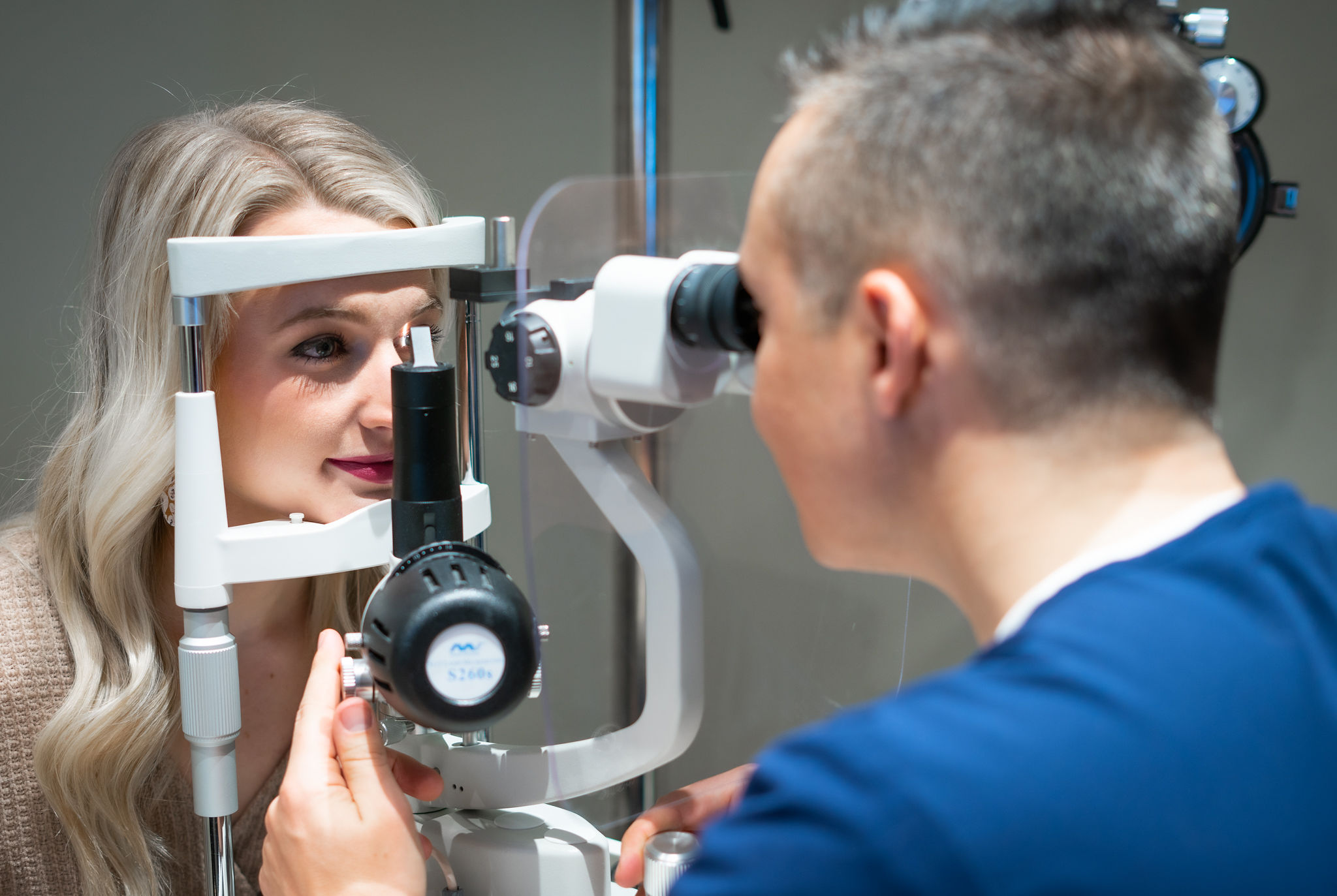 Dr. Luke Rebenitsch examining a patient