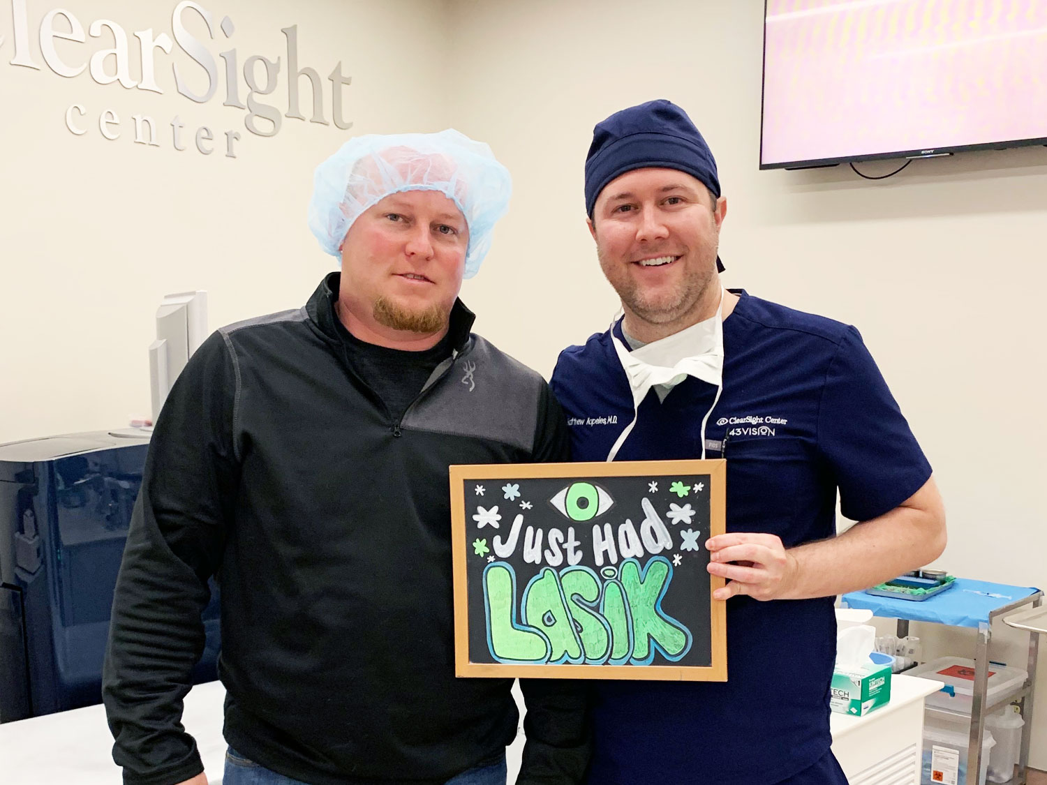 Dr. Matthew Kapeles MD - Clearsight LASIK and Lens - celebrating with a patient after performing his successful LASIK eye surgery.