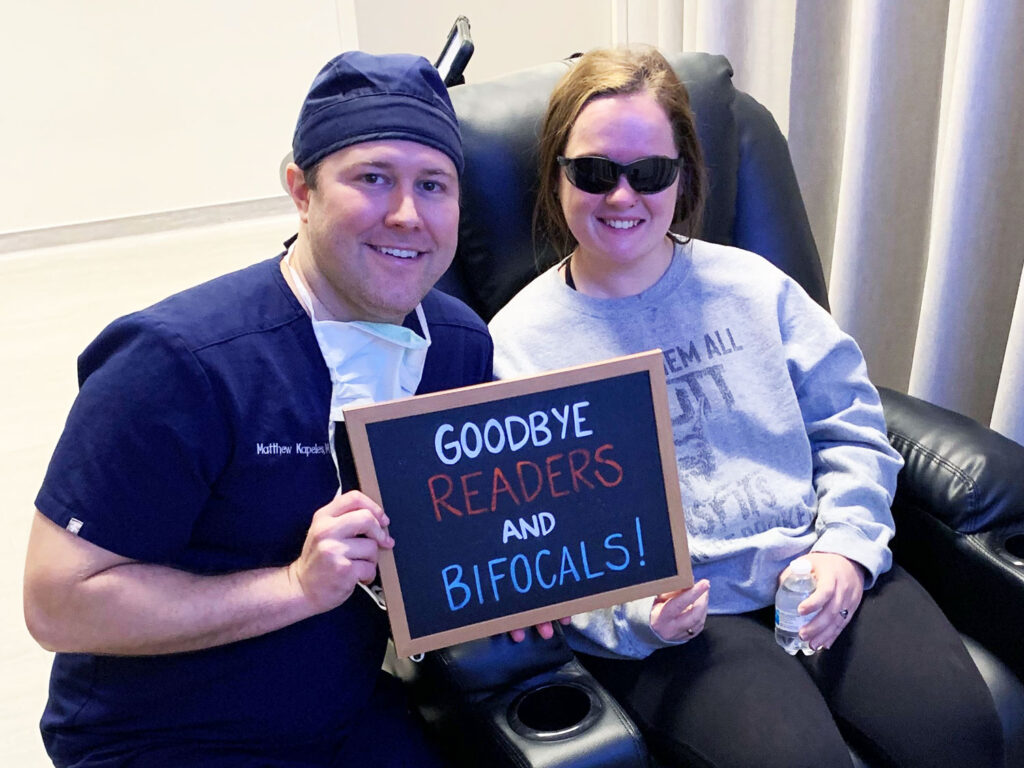 Dr. Matthew Kapeles MD - Clearsight LASIK and Lens - celebrating with a patient after a successful custom lens replacement. Custom lens replacement can treat nearsightedness, farsightedness, astigmatism, and even presbyopia.