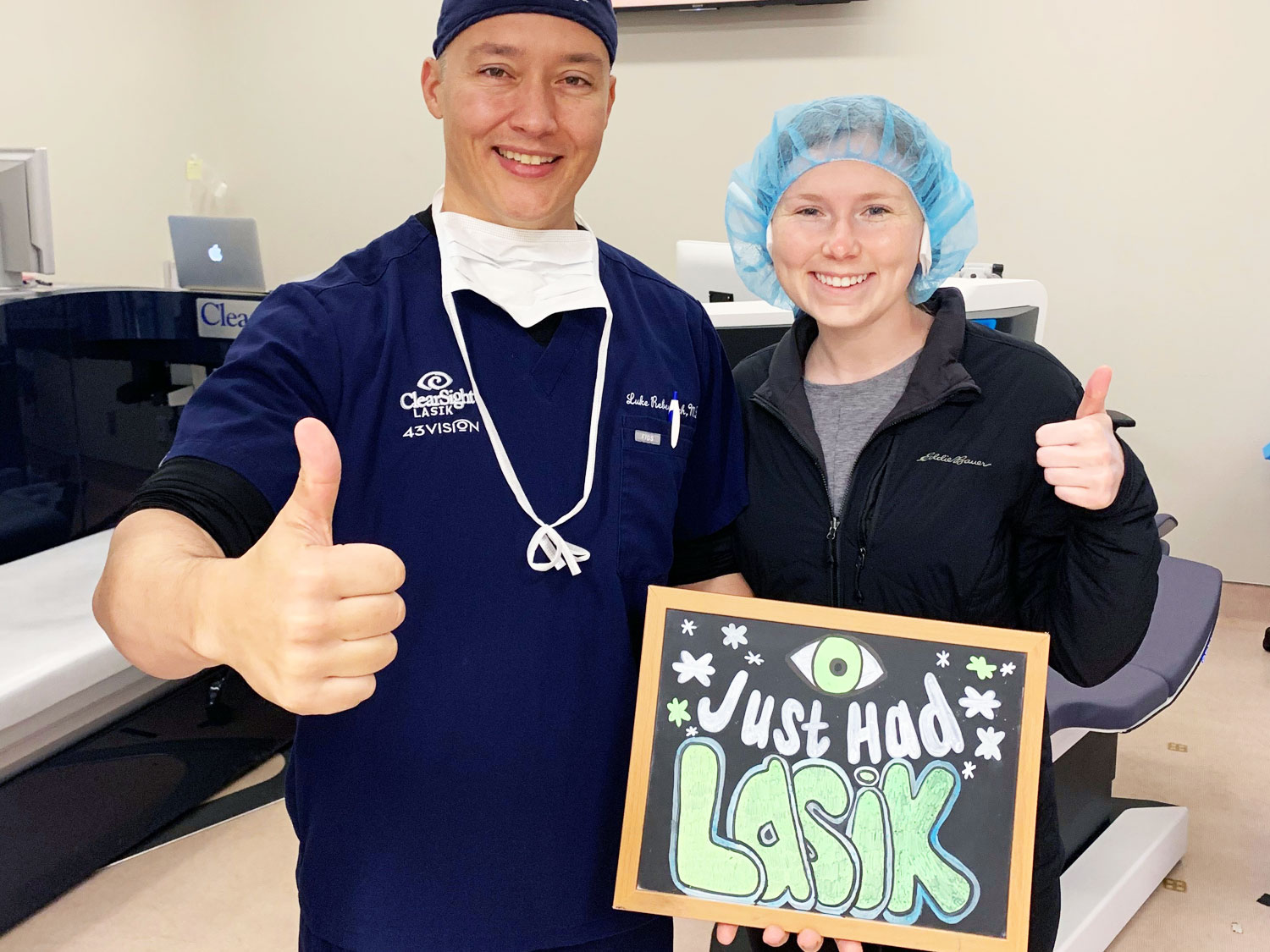 Dr. Luke Rebenitsch MD - Clearsight LASIK and Lens - celebrating with his patient after her successful LASIK eye surgery. Clearsight LASIK and Lens offers every client a wonderful and unique experience.
